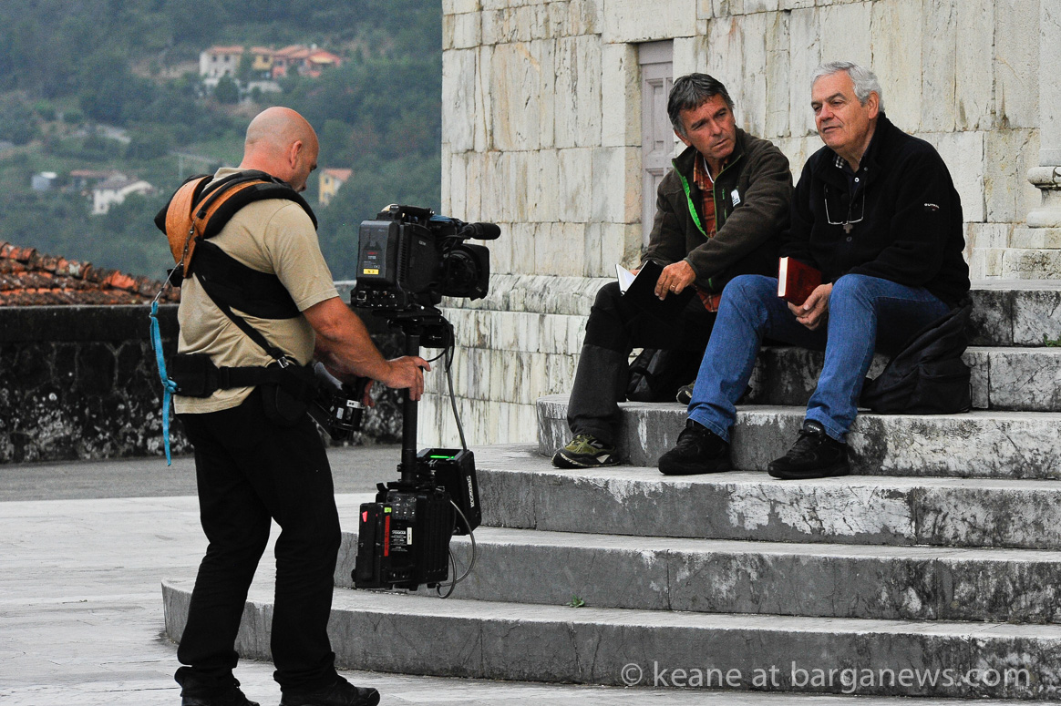 Padre Ermes Ronchi and RAI 1 filming in Barga